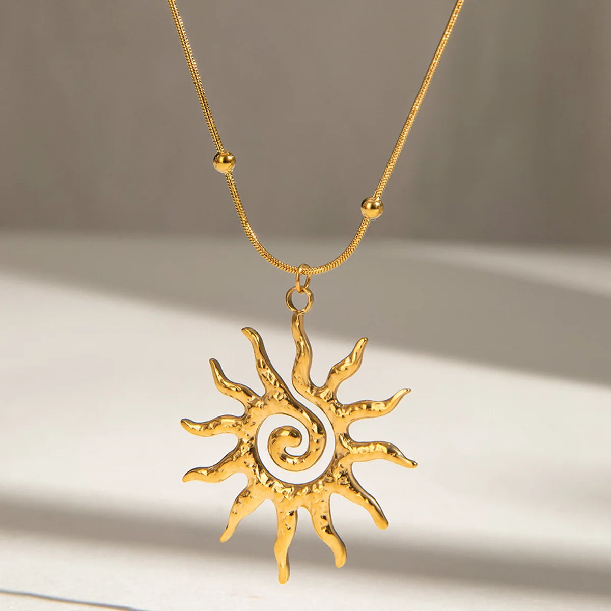 Golden Sun Swirl Pendant Necklace