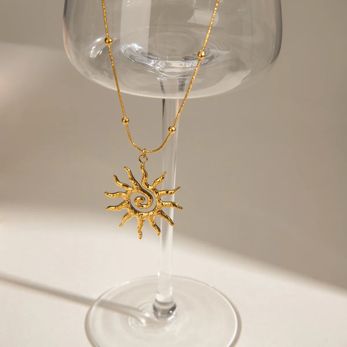 Golden Sun Swirl Pendant Necklace