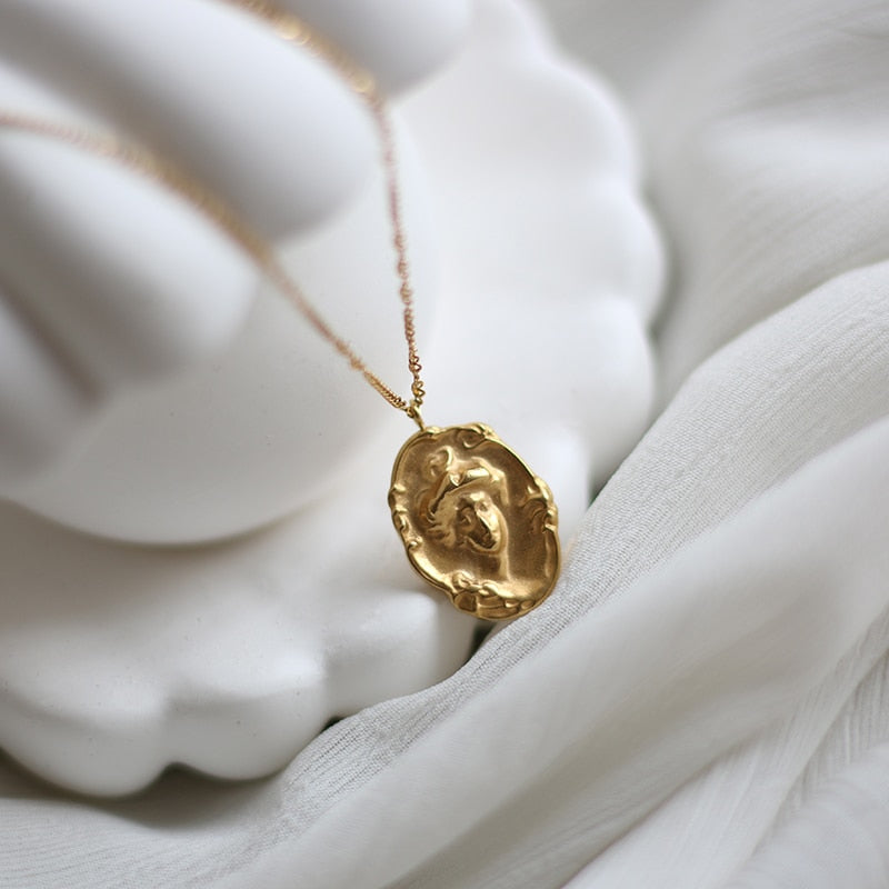 Jagged Oval Coin Pendant Necklace
