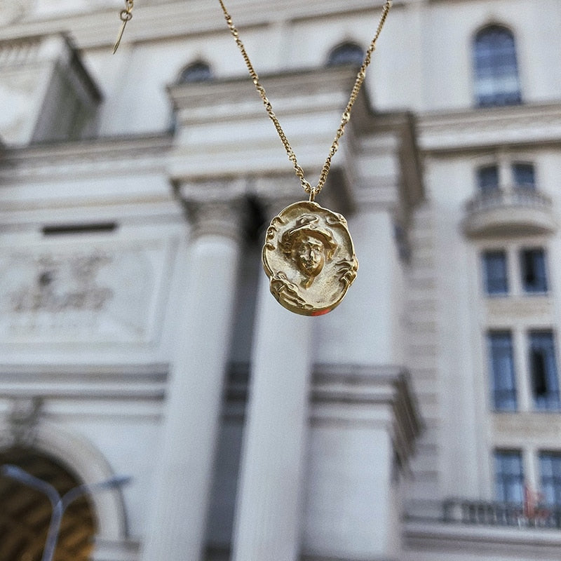 Jagged Oval Coin Pendant Necklace